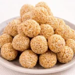 Tella Nuvvulu Laddu / Chikki (Jaggery)